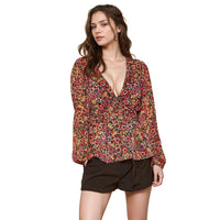 Pleione Women's V-Neck Puff Sleeve Top in Fuchsia