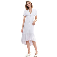 Woman wearing a white dress on a white background