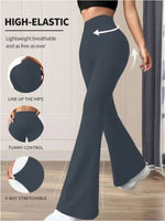 Dark blue leggings being worn by a person, with text highlighting features like high-elasticity and tummy control.