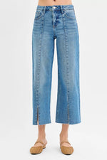 Blue jeans with a white background