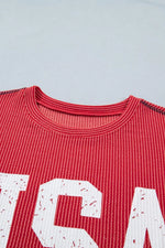Red shirt with white text on a light gray background