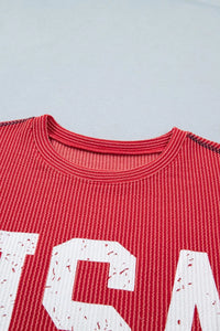 Red shirt with white text on a light gray background