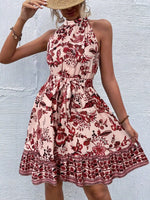 Woman wearing a floral dress with a textured white background