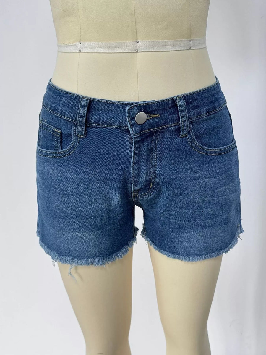 Blue denim shorts on a mannequin against a white background