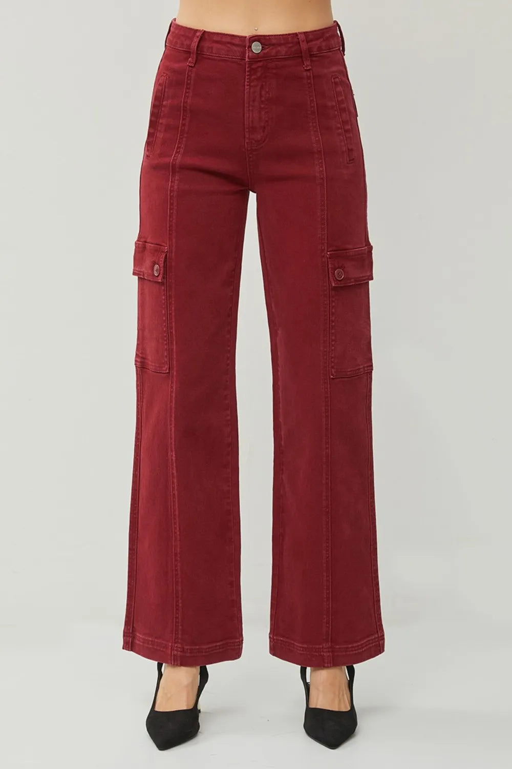 Red cargo pants on a plain background