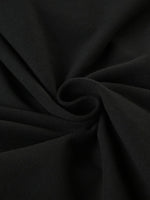 Close-up of black fabric with folds