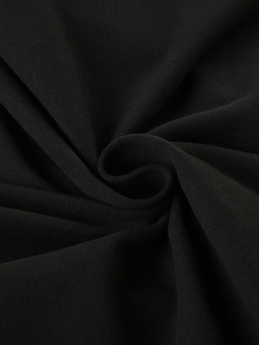 Close-up of black fabric with folds
