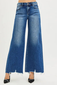 Blue wide-leg jeans on a white background