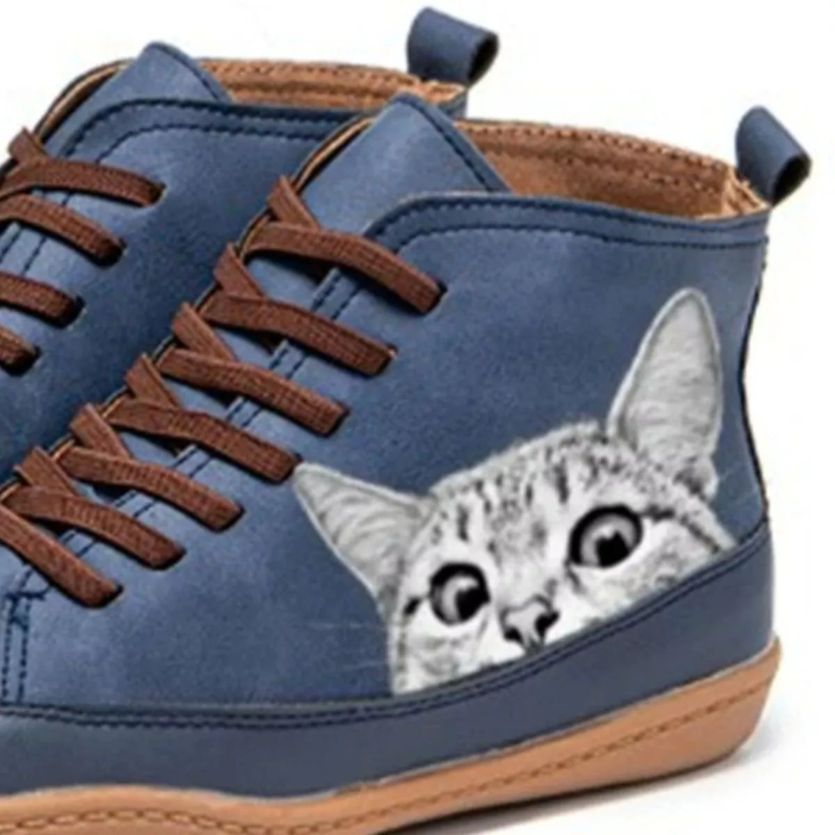 Blue shoe with a cat design on a white background