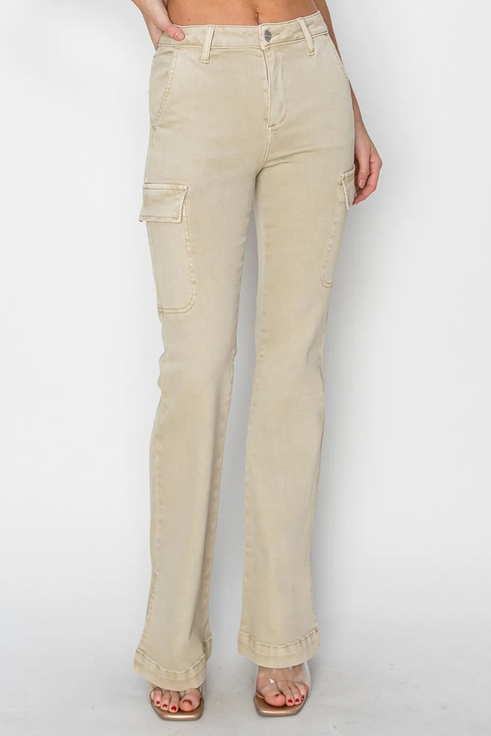 Beige flared jeans on a white background