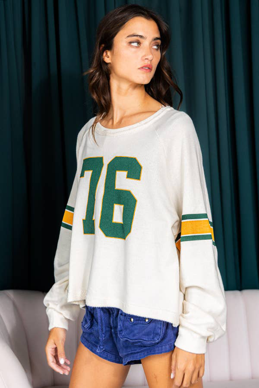 Side view of Number 76 Round Neck Long Sleeve Top