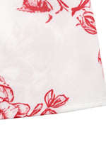 White fabric with red floral pattern