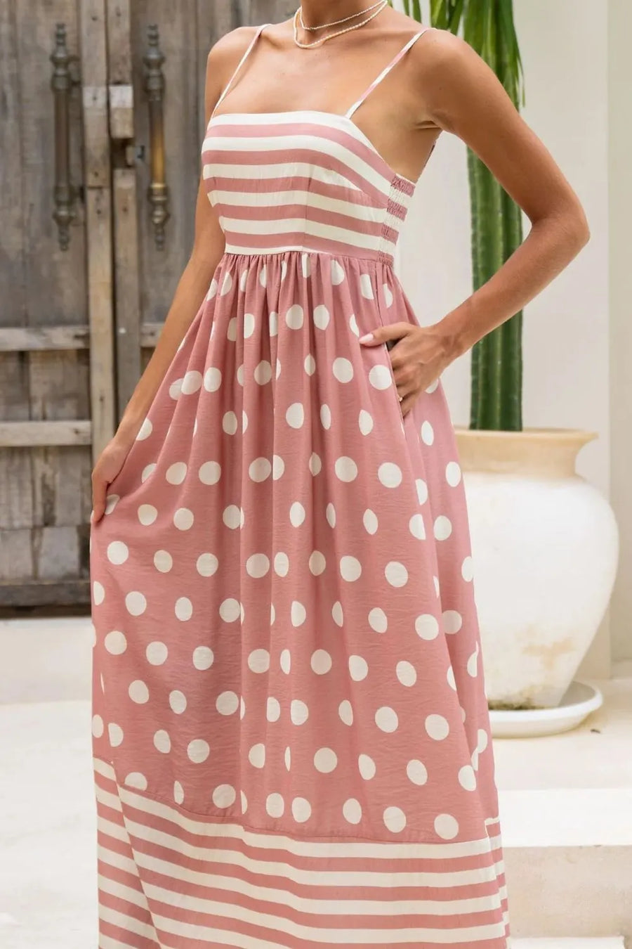 Woman showing pocket on Polka Dot Square Neck Cami Dress