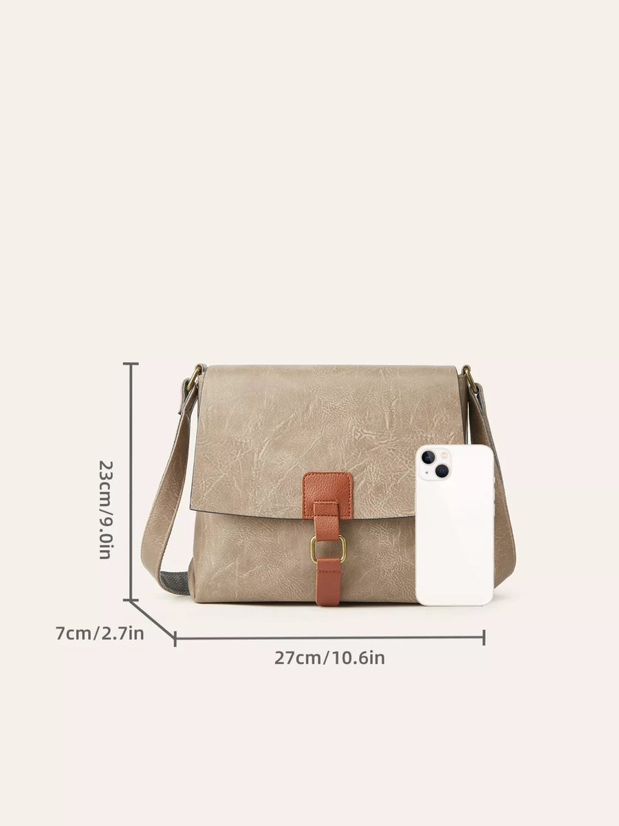 Beige handbag with brown strap and dimensions displayed on a white background