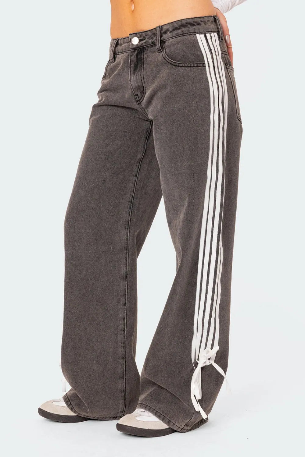 Gray jeans with white stripes on a white background