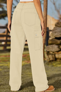 Beige cargo pants worn by a person outdoors with a natural background