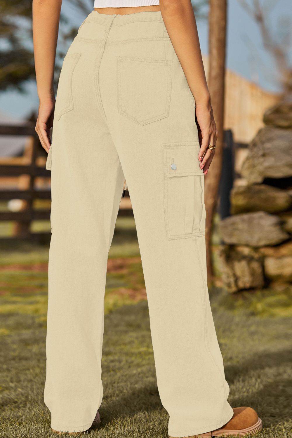 Beige cargo pants worn by a person outdoors with a natural background