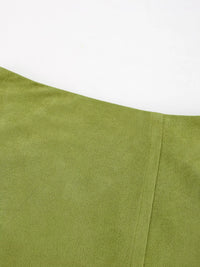 Close-up of a green fabric with a white background