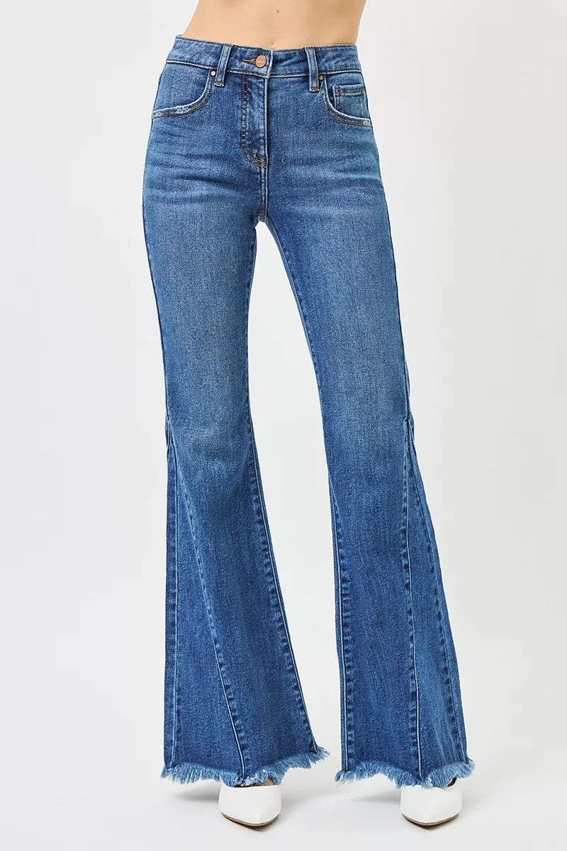 Blue flared jeans on a white background