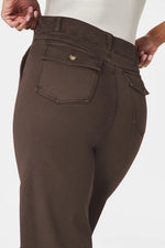 Brown pants with a visible brand logo on a white background