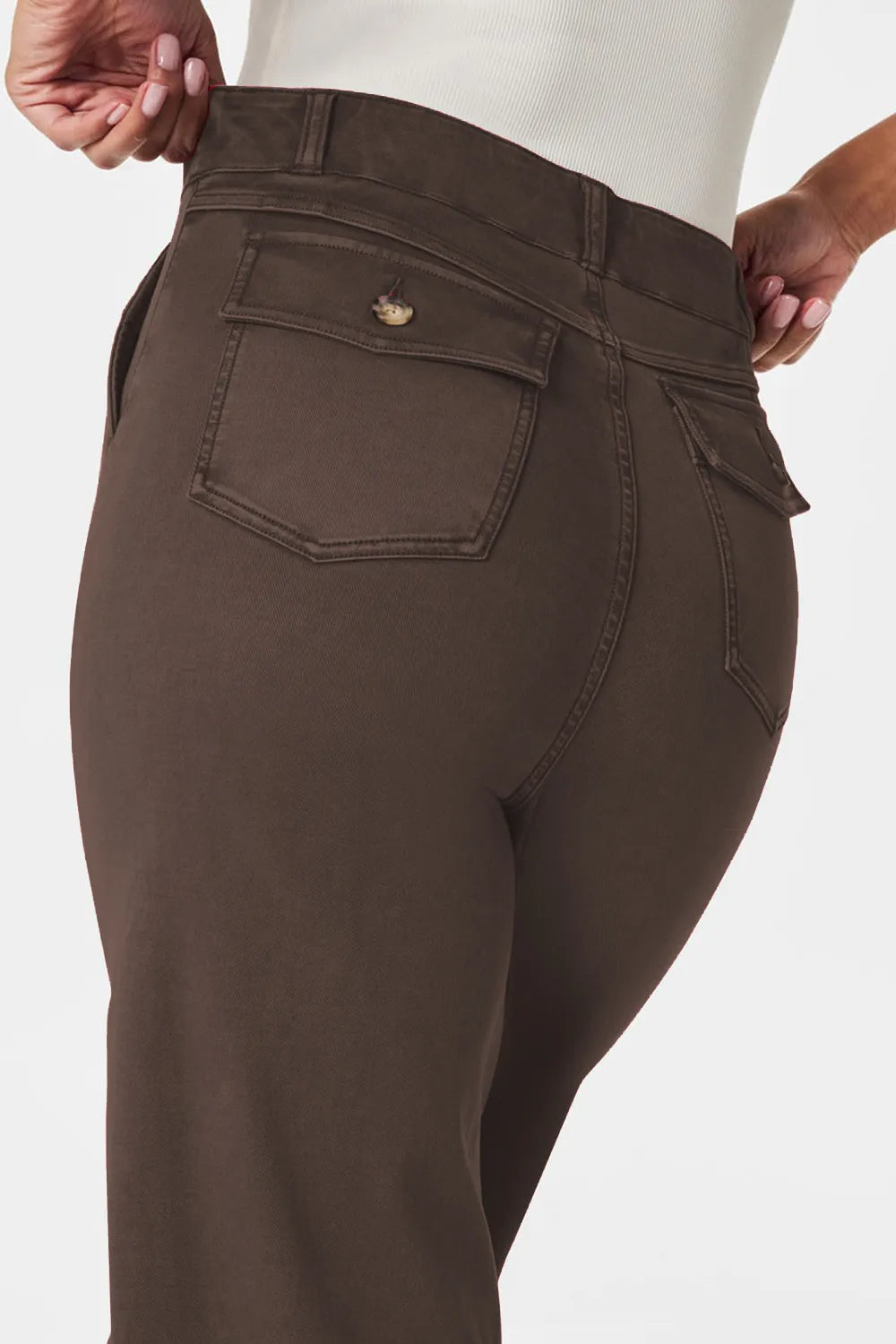 Brown pants with a visible brand logo on a white background