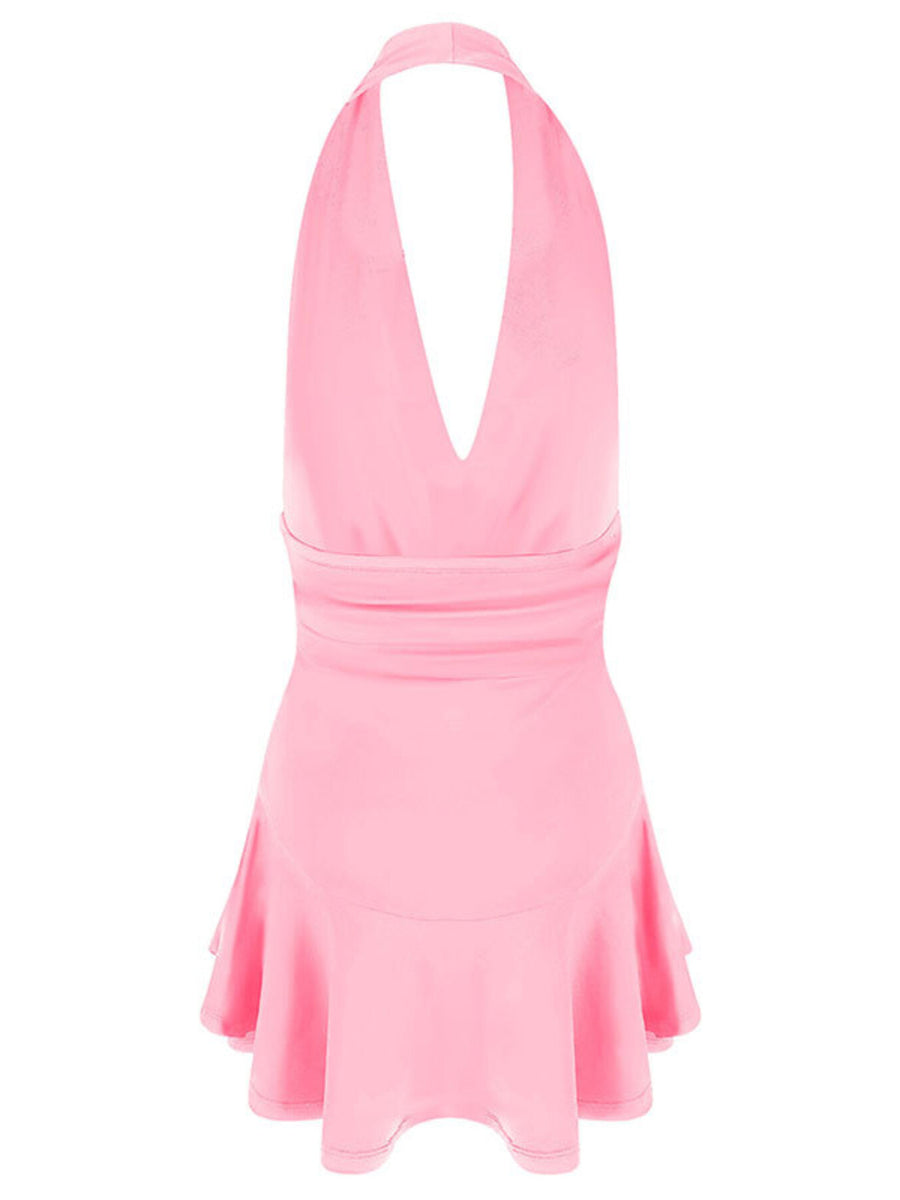 Pink halter dress on a white background