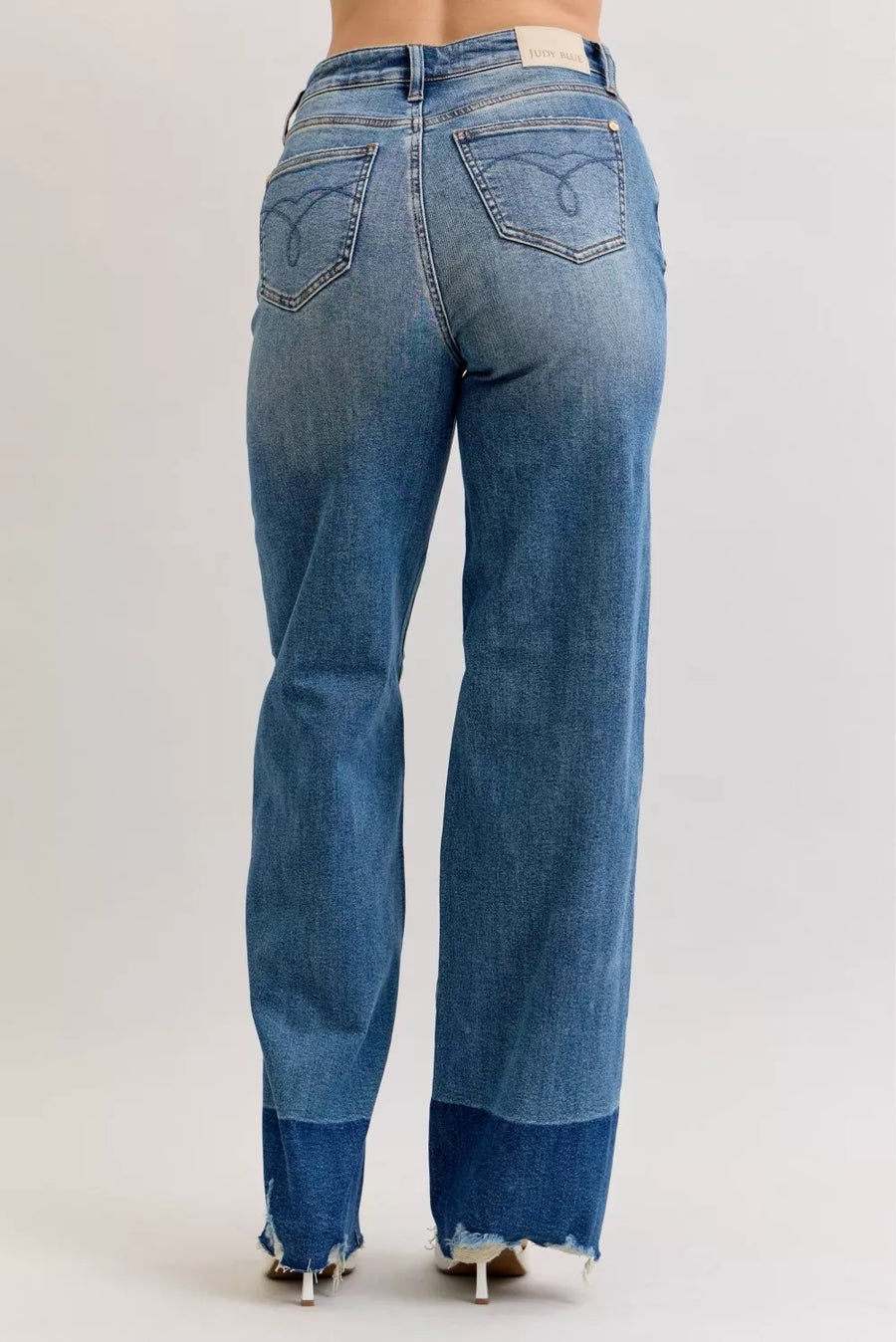 Blue jeans with a white background