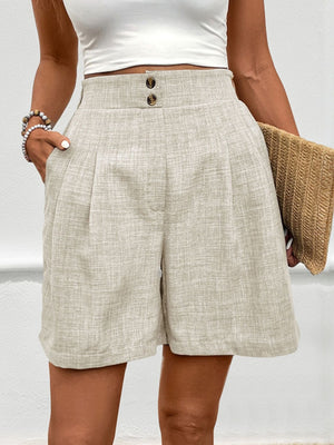 View of pocket on beige Perfee Frill Shorts with Pockets