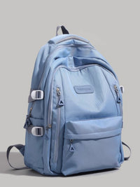 Blue backpack on a gray background