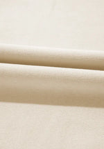 Close-up of beige fabric texture