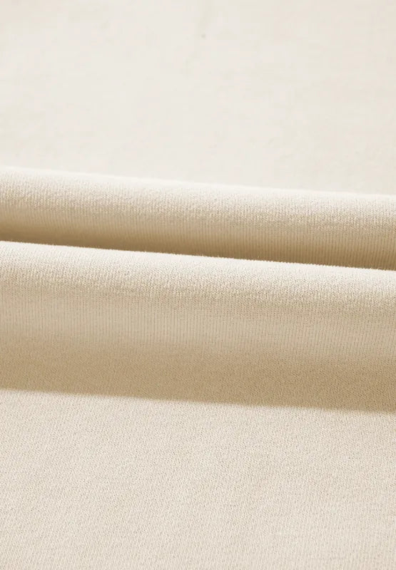 Close-up of beige fabric texture