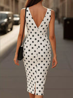 Back view of Polka Dot Wrap Midi Dress with Front Tie