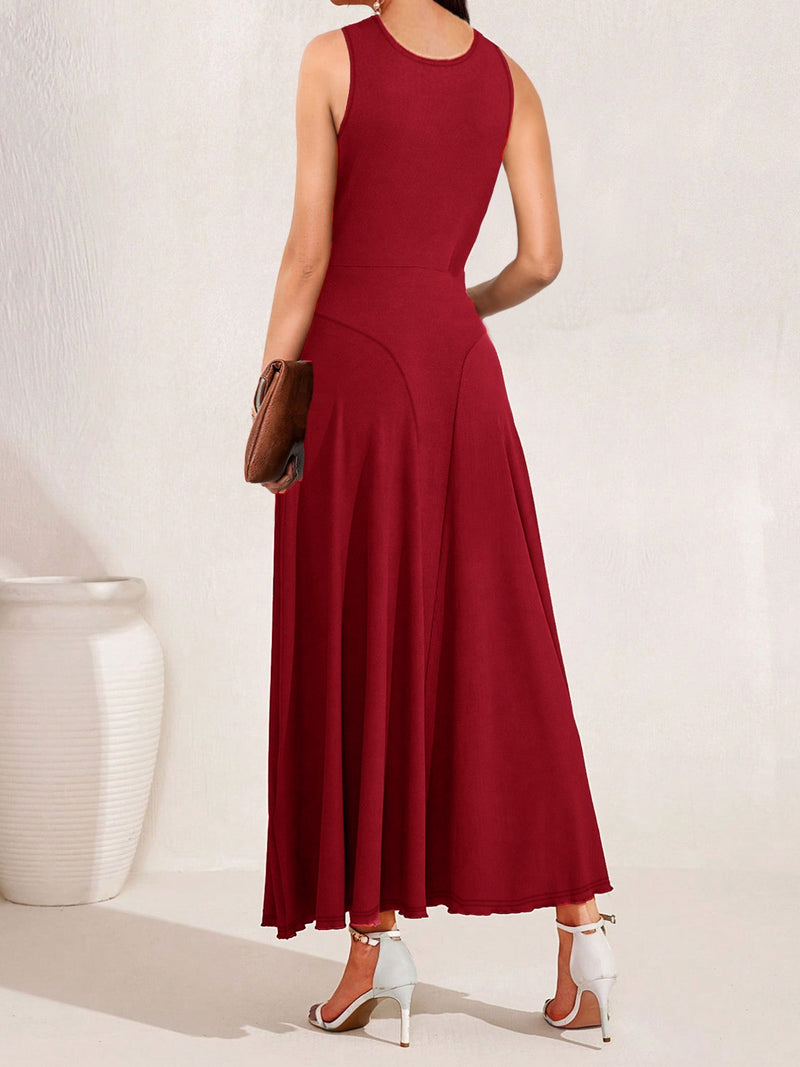 Woman wearing a red dress with a white background