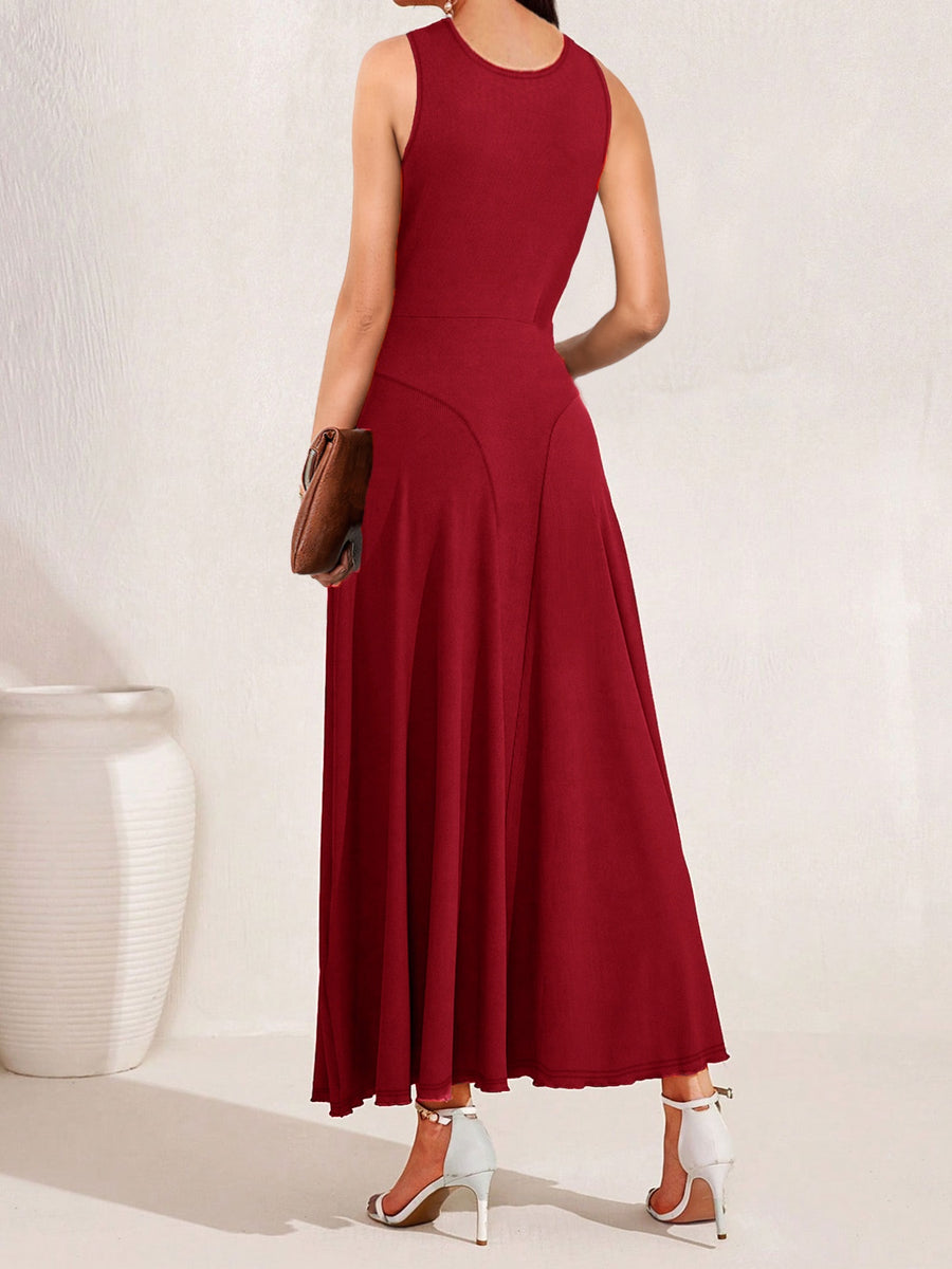 Woman wearing a red dress with a white background