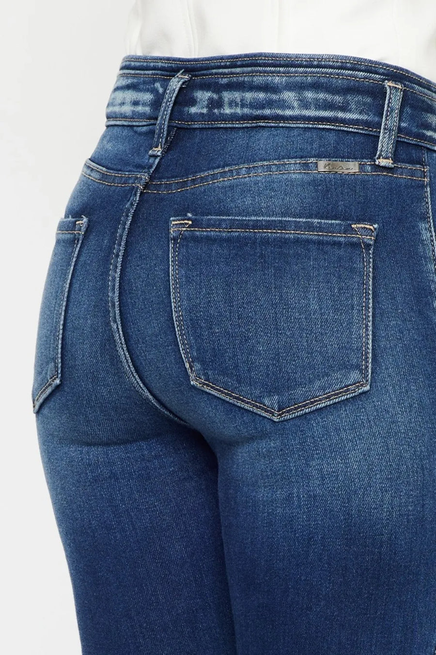 Blue jeans with a white background