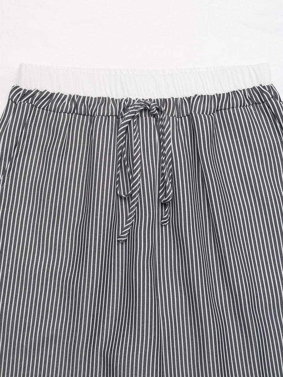 Striped pants with a tie waist on a white background