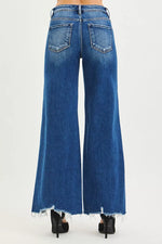 Blue jeans with a white background