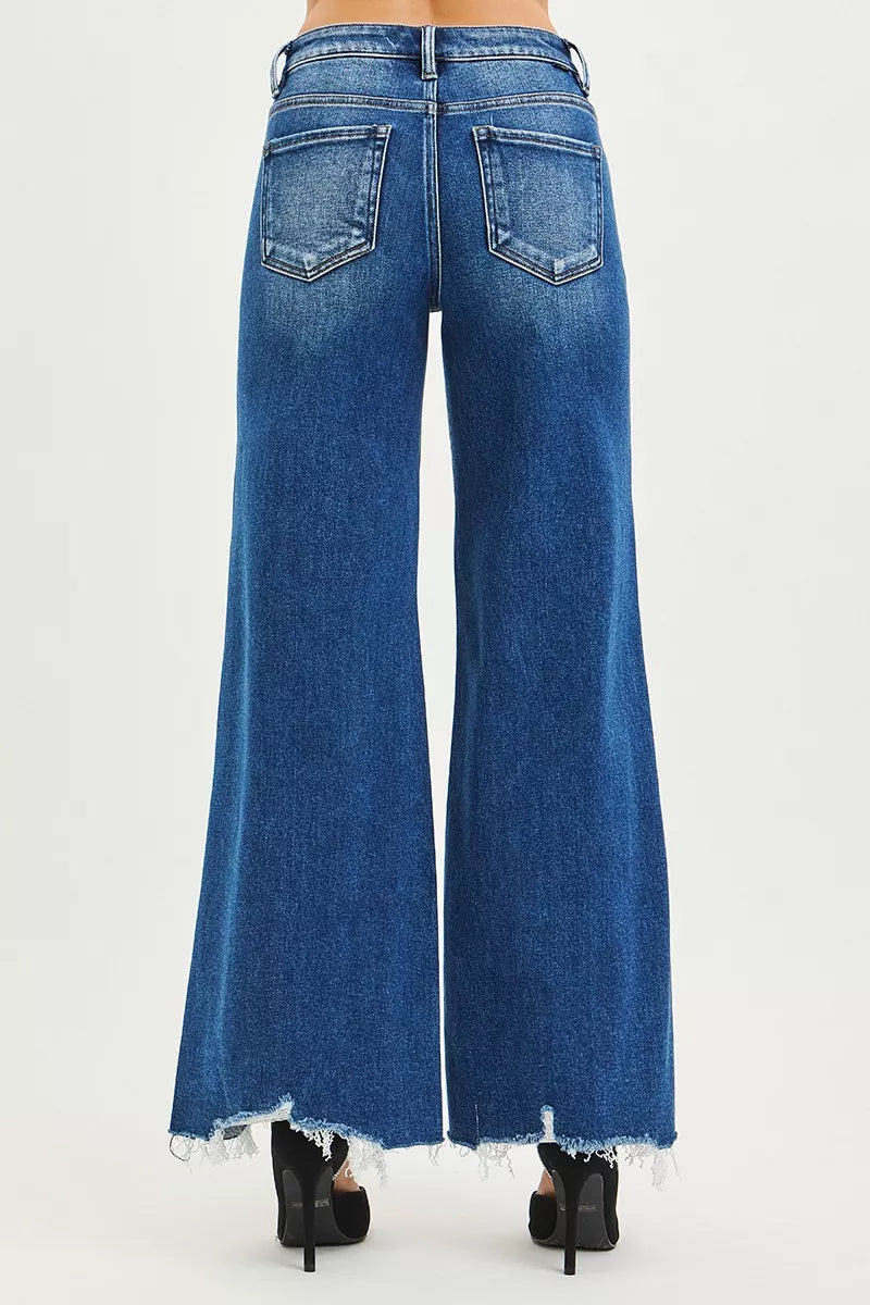 Blue jeans with a white background