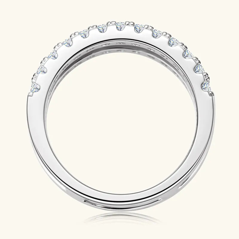 Silver ring with small diamonds on a white background