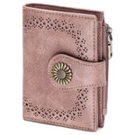 Pink wallet with floral design on a white background