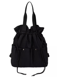 Black drawstring bag with multiple pockets on a white background