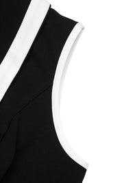 Black sleeveless top with white trim on a white background