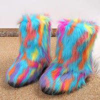 Colorful fuzzy boots on a carpeted floor