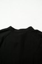 Black garment on a white background