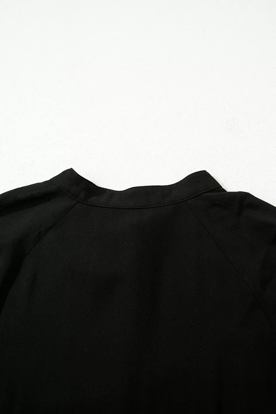 Black garment on a white background