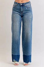 Blue jeans with a white background