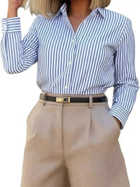 Person wearing a blue and white striped shirt with beige pants on a white background