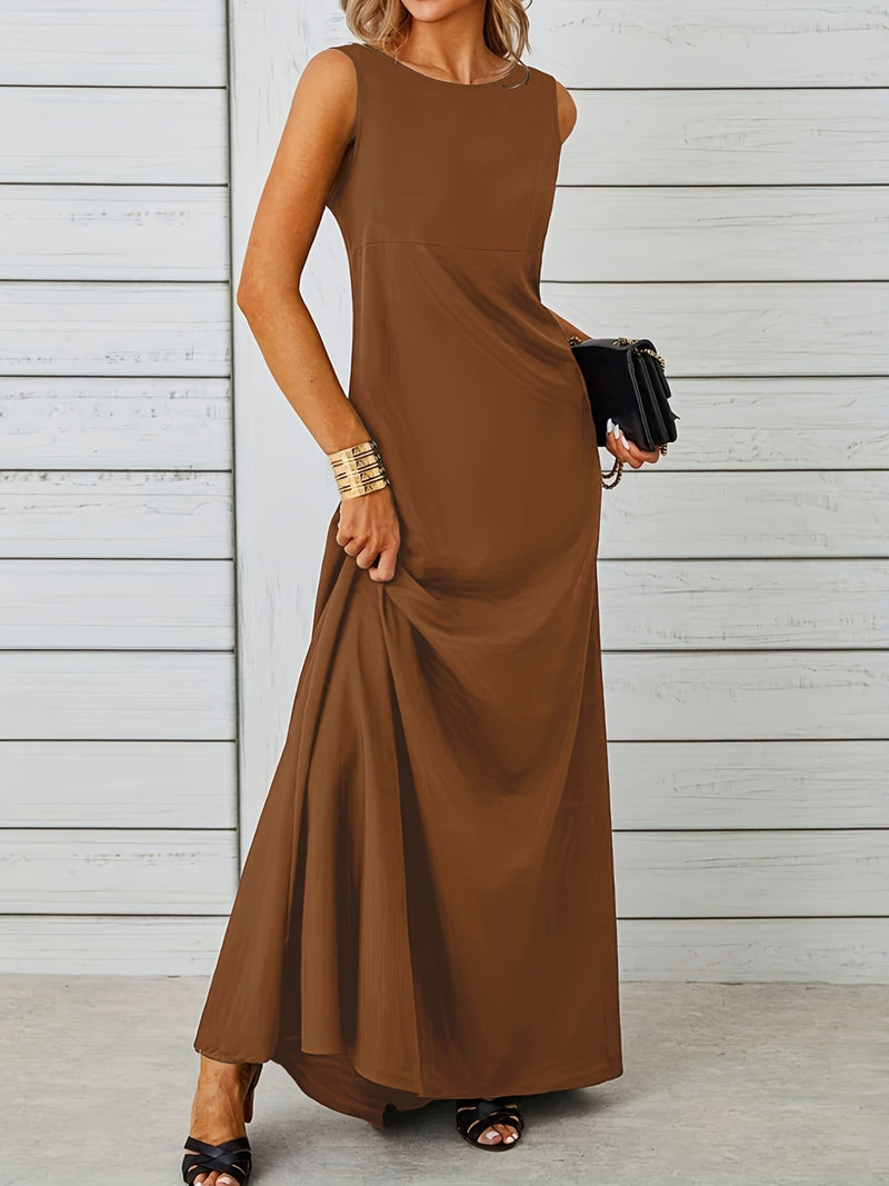 Woman wearing a brown sleeveless dress against a light wooden panel background