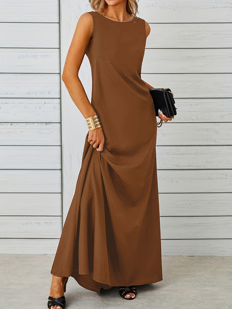 Woman wearing a brown sleeveless dress against a light wooden panel background