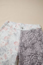 Two pairs of pants with floral and leopard print on a beige background